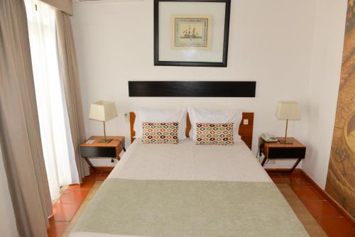 Кровать или кровати в номере LagosMar Story Hotel