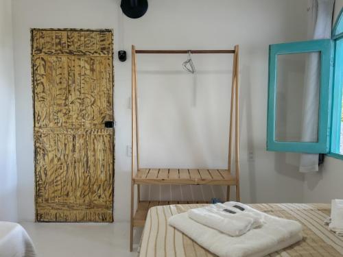 Postel nebo postele na pokoji v ubytování Vila Rita Hostel Arraial d'Ajuda
