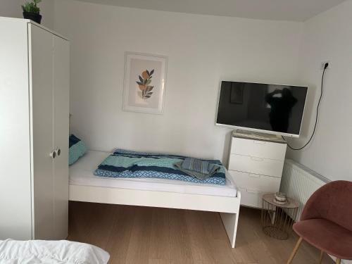 Ein Bett oder Betten in einem Zimmer der Unterkunft Großes Appartement Umgebung Frankfurt am Main Monteure geeignet