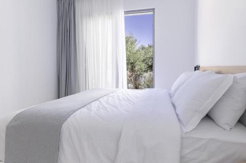Ein Bett oder Betten in einem Zimmer der Unterkunft Largo Seaside Retreat