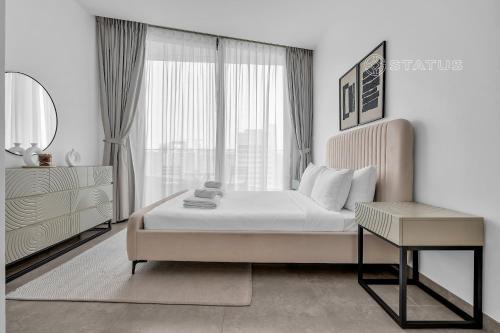 Postel nebo postele na pokoji v ubytování Luxury 1BR - Stella Maris-L29 - Near Marina Walk