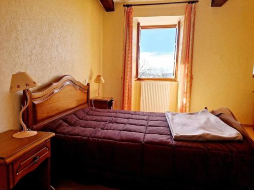 Postel nebo postele na pokoji v ubytování Gîte de Saint-Gervais