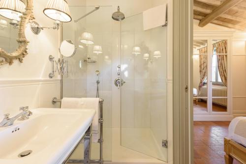 a bathroom with a shower and a sink at Villa Conca d'Oro by Mmega in Greve in Chianti