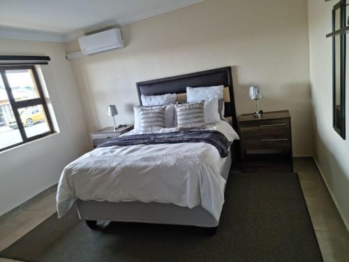Ένα ή περισσότερα κρεβάτια σε δωμάτιο στο Lasev guesthouse