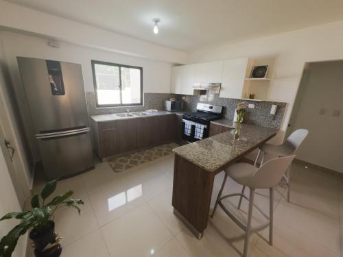 Η κουζίνα ή μικρή κουζίνα στο Apartamento Coral azul