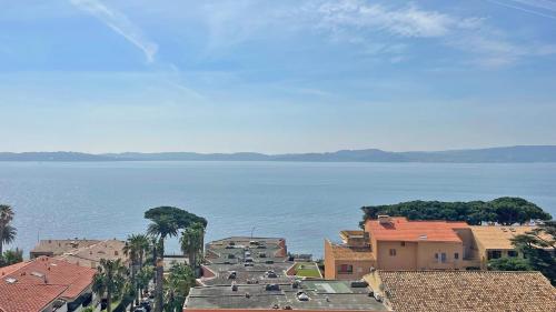 an aerial view of a city and the water at Grand Hotel - Appartement in Sainte-Maxime