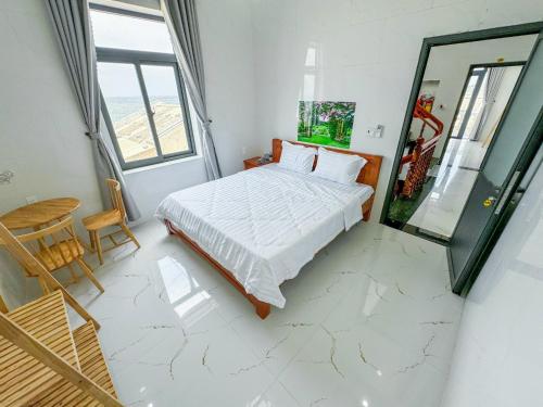 Postel nebo postele na pokoji v ubytování Homestay Tiến Đạt