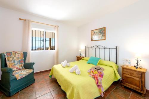A bed or beds in a room at Villa Los Sanchez