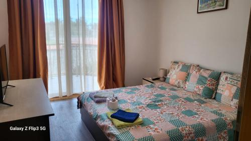 Postel nebo postele na pokoji v ubytování Апартамент Blue sky