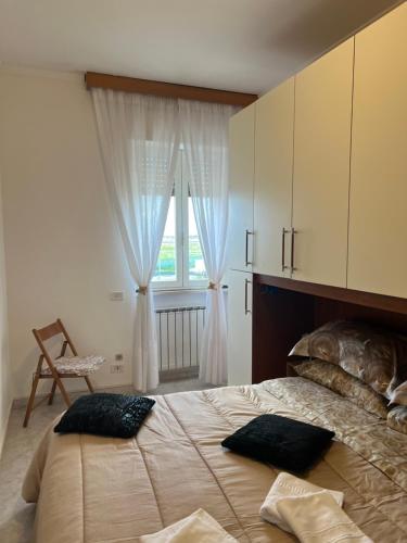 Postel nebo postele na pokoji v ubytování Alloggio turistico FRANCY HOME