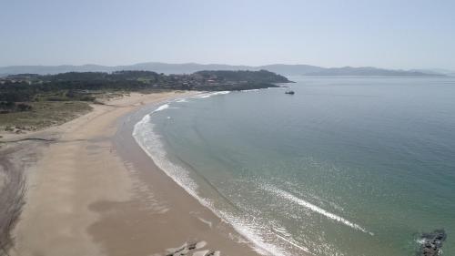 an aerial view of a beach with a boat in the water at Villa Montalvo Beach in Montalvo