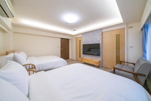 Luodong Park Villa B&Bにあるテレビまたはエンターテインメントセンター