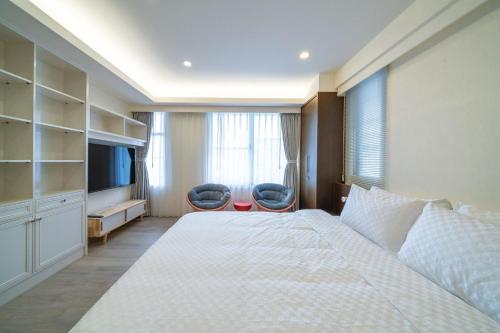Luodong Park Villa B&Bにあるベッド