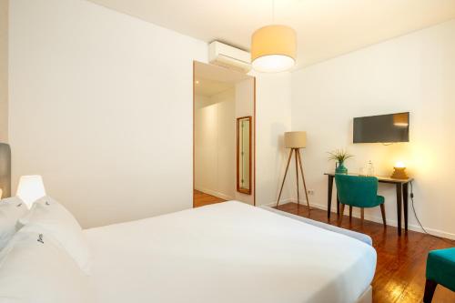 Letto o letti in una camera di Bica FLH Suites
