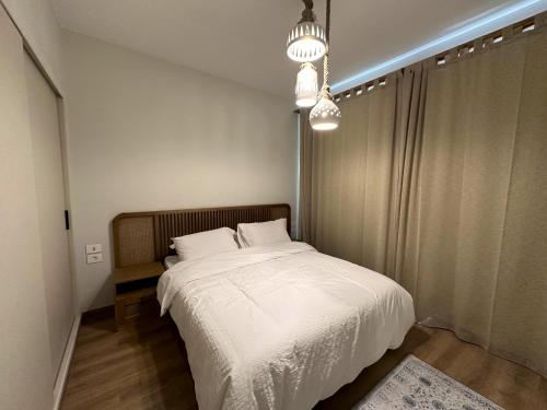 Ένα ή περισσότερα κρεβάτια σε δωμάτιο στο Charming 3BR Villa/Free Pool & Lagoon Access@Gouna