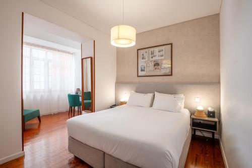 Letto o letti in una camera di Bica FLH Suites