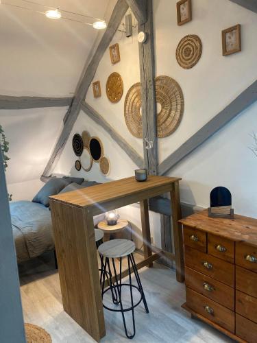 Postel nebo postele na pokoji v ubytování Appart hôtel Toucy 3