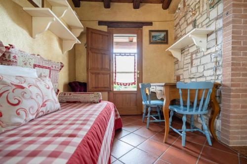 Postel nebo postele na pokoji v ubytování L'antica quercia