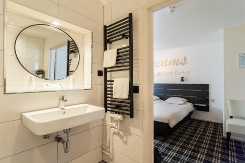 Et badeværelse på Hotel Van der Maas