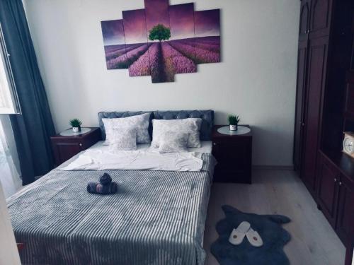 Un pat sau paturi într-o cameră la Apartman Diva