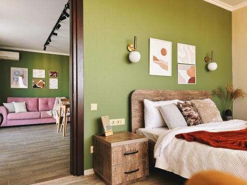 Llit o llits en una habitació de Sunset Apartment