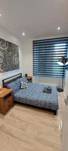 Cama o camas de una habitación en Paisley Pattern Flat West End UWS UNI GLA Glasgow Airport
