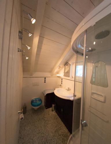 a bathroom with a sink and a toilet at Bonavista Brela in Brela