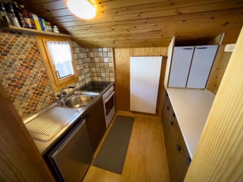 Virtuvė arba virtuvėlė apgyvendinimo įstaigoje Chalet Talblick