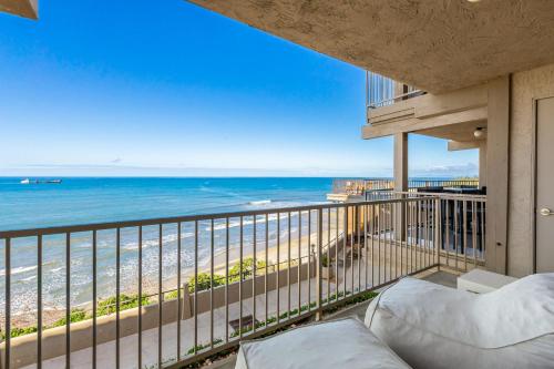 a balcony with a view of the beach at Del Mar Gem condo in Solana Beach