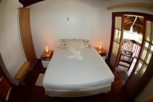 Postel nebo postele na pokoji v ubytování SURF E VIDA