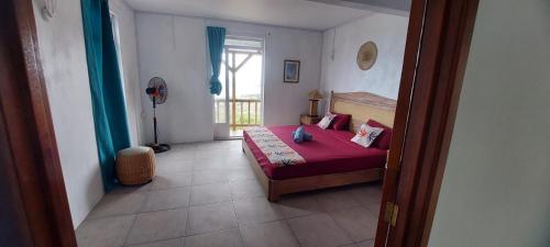 Postel nebo postele na pokoji v ubytování Residence le bijou mourouk rodrigues