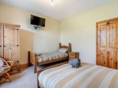 Ένα ή περισσότερα κρεβάτια σε δωμάτιο στο 2 Bed in Millom 93608