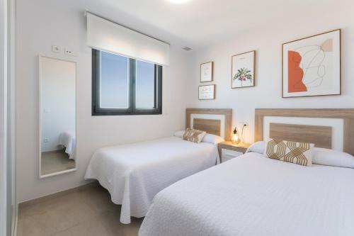 Postel nebo postele na pokoji v ubytování AG Residencial El Alamo