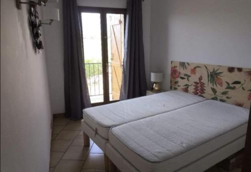 Postel nebo postele na pokoji v ubytování Appartement vue mer Les hameaux de Propriano à Propriano