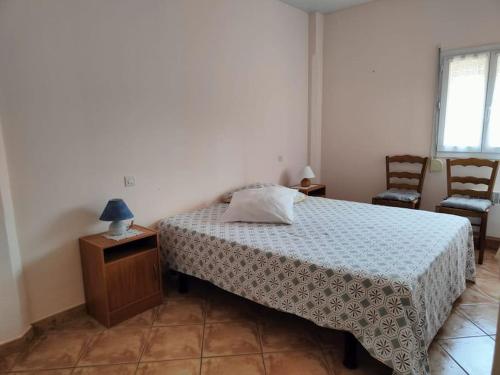 Un pat sau paturi într-o cameră la Casa Bretalunya