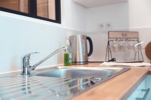 Dapur atau dapur kecil di Le Baudelaire, T3 en duplex