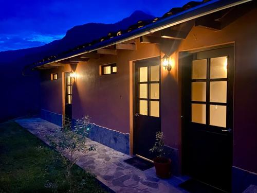 a house with a door at night at La Casa de Mario - Gocta in Cocachimba