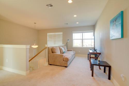 a living room with a couch and a table at Modern Lago Vista Home with Pool and Lake Access! in Lago Vista