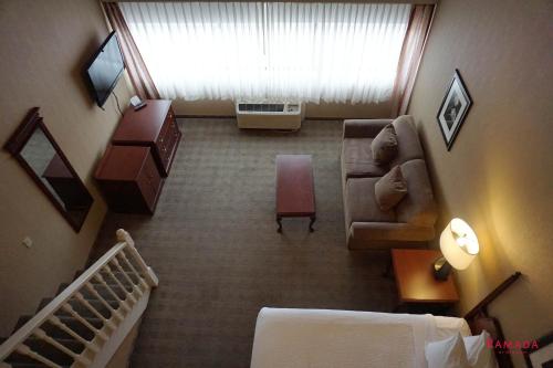 an overhead view of a living room with a couch at Ramada by Wyndham Kelowna Hotel & Conference Center in Kelowna