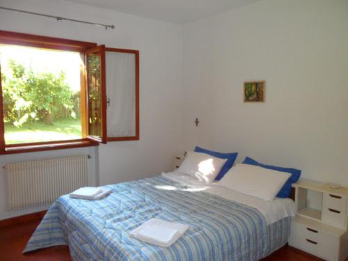 Postel nebo postele na pokoji v ubytování B&B Cuei di Baret