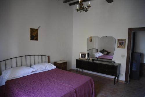 Postel nebo postele na pokoji v ubytování Appartamento Nonna Beppa