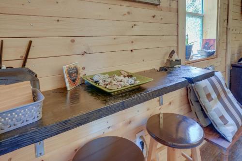 a wooden counter with a plate of food on it at Eagles Nest Studio in Rising Fawn Creek Access in Rising Fawn