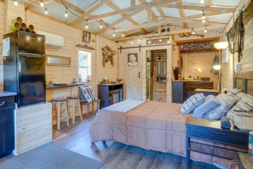 a bedroom with a bed and a kitchen at Eagles Nest Studio in Rising Fawn Creek Access in Rising Fawn
