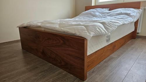 Postel nebo postele na pokoji v ubytování Wygodny apartament