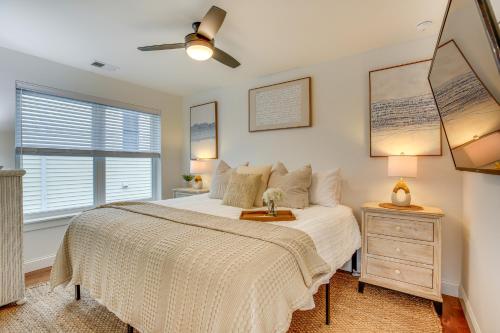 a bedroom with a bed and a window at The Kraken Wildwood Townhome half Mi to Beach! in Wildwood