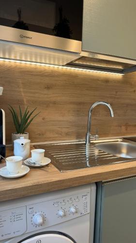 Kuchyň nebo kuchyňský kout v ubytování Casa Rosetta - Relax in Centro, Parcheggio Privato, Mare a 2 Passi