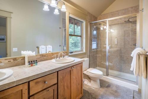 a bathroom with a sink and a shower and a toilet at Family Home, Hot Tub, Suncadia Pool Access in Cle Elum