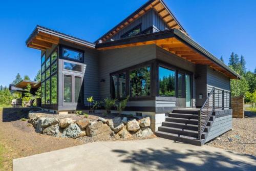 a small house with a staircase in front of it at Suncadia 5 Bdrm Home Perfect Private Retreat in Cle Elum