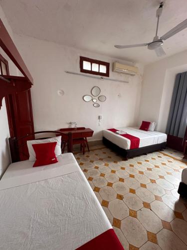 Postel nebo postele na pokoji v ubytování Hotel Margarita
