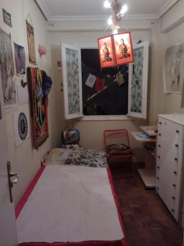 A bed or beds in a room at Habitación acogedora por días